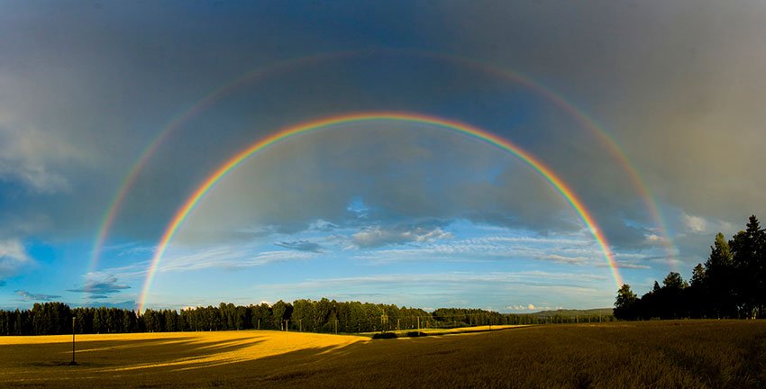 full rainbows in the sky