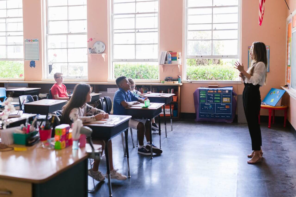 A teacher and students in a classroom